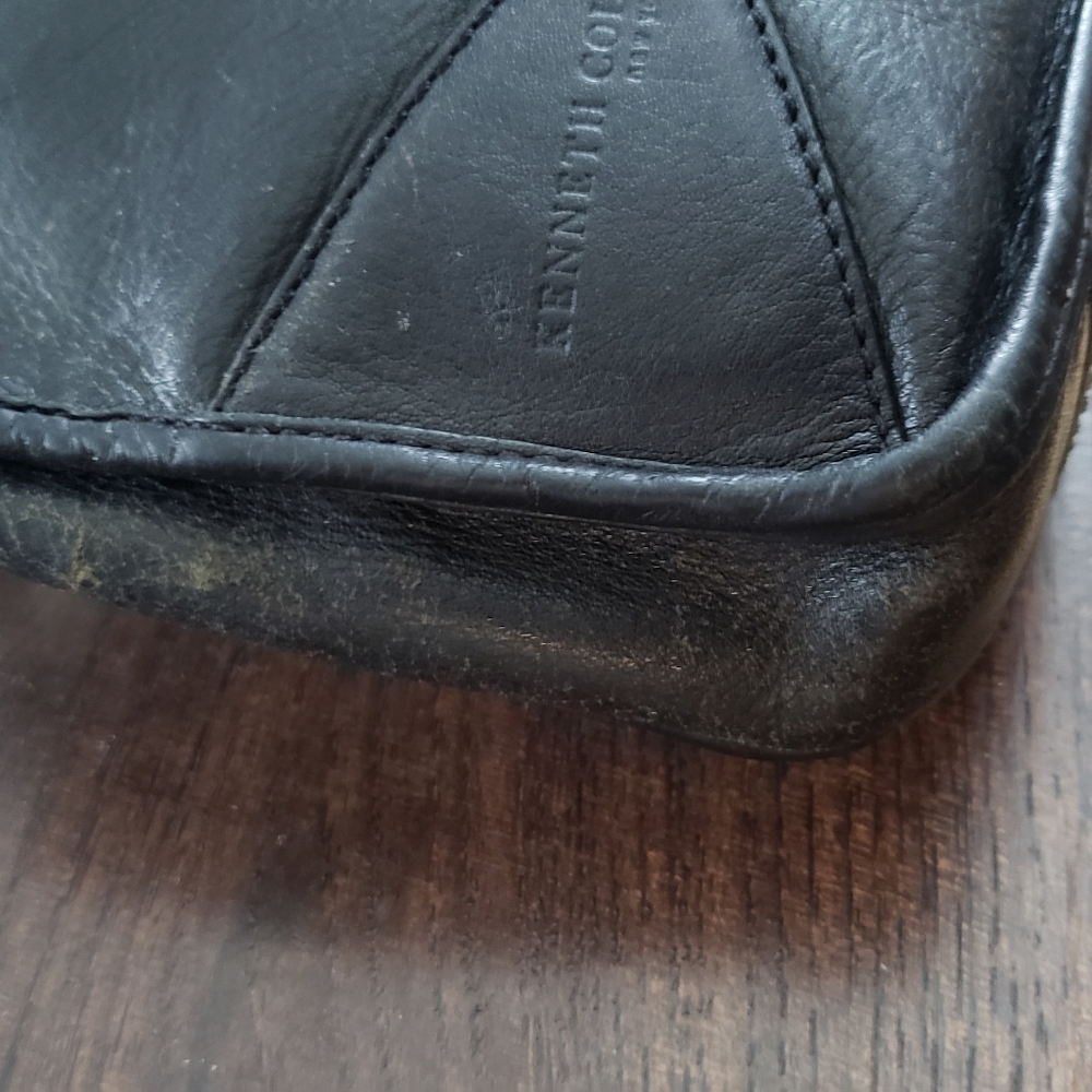 Kenneth Cole Clutch Bag Leather.  Needs cleaning. Small holes